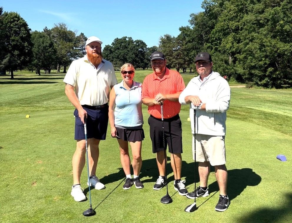 Golf team at the July 2026 outing