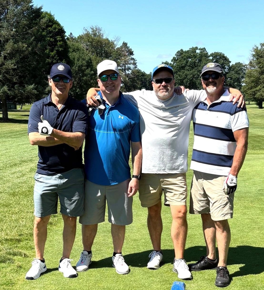 Golf team at the July 2026 outing