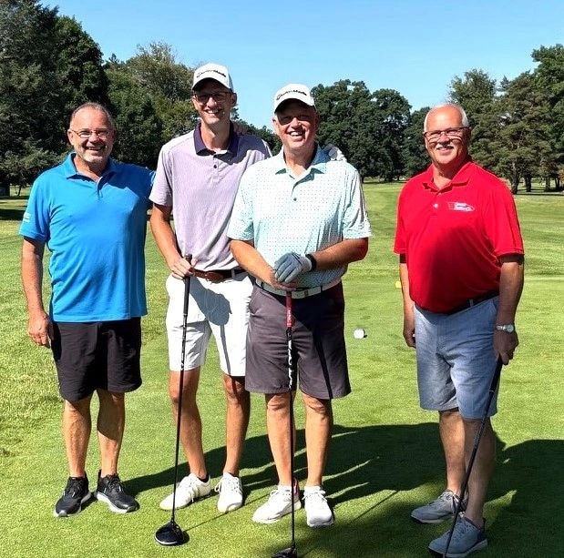 Golf team at the July 2026 outing