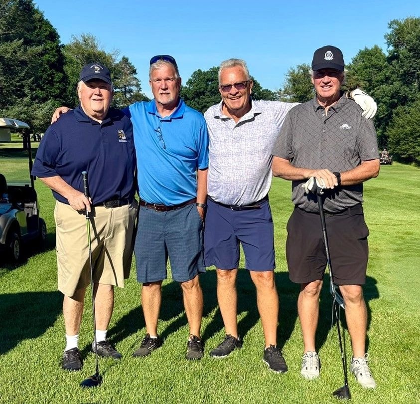 Golf team at the July 2026 outing