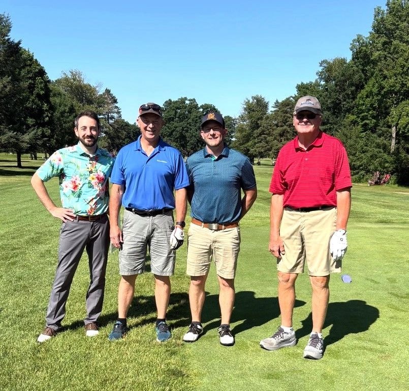 Golf team at the July 2026 outing