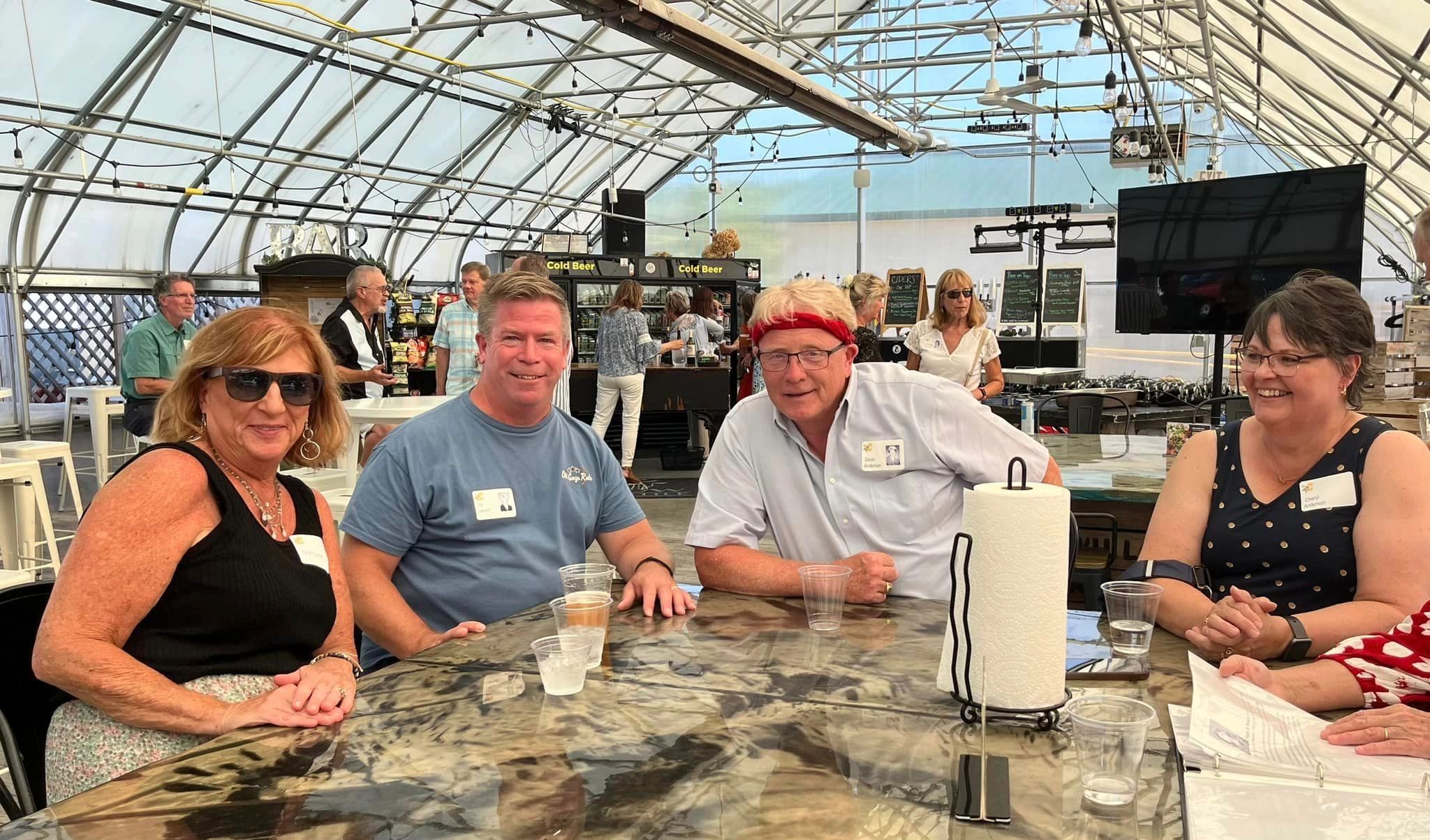 Tim Laurent and Dave Anderson with spouses
